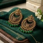 Antique Gold-Plated Lakshmi Chandbali Earrings with Emerald Green Beads