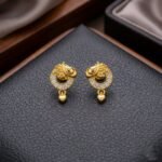 Aurelia Mango Motif Studs with Heart Drop