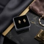 18K Gold Diamond Swirl Stud Earrings.