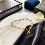 Gold Bezel-Set Pearl Station Bracelet